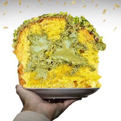 La Pistacchiona: Colomba maxi, artigianale ed extra morbida, farcita con 500 gr di crema Pistacchione Gold e copertura croccante Rocher al pistacchio
